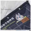 SERIA MONȘTRII CĂDEAU ÎN SĂLBĂTICIE – Geantă denim Messenger
