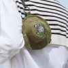 SERIA MONȘTRII CĂDEAU ÎN SĂLBĂTICIE – Geantă mini tip pălărie tip găleată, cutie BIind SERIA MONȘTRII CĂDEAU ÎN SĂLBĂTICIE – Geantă mini tip pălărie tip găleată, cutie BIind